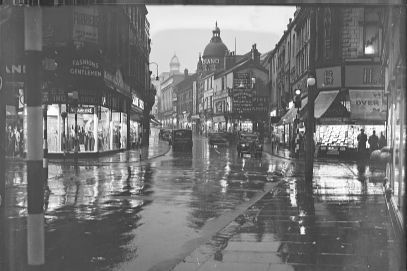 Church Street close to the junction of Bank Hey Street, with the familiar site of The Grand Theatre ( in the centre) and H Samuels (on the right)
