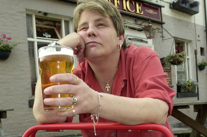 Sandra Hearn landlady at the Post Office pub in Kirkham which had started a grumpy hour, 2001