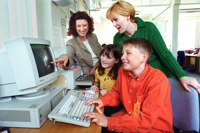 Bring your children to work day at the Benefits Agency, Norcross, Blackpool. Pictured are Banking and Accountancy staff - Verity Southworth (right) with daughter Katie (11) , and Cheryl Holloway with son David (12), 1998