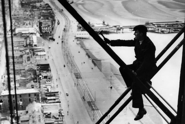 4th December 1947, 500 ft up Blackpool Tower where repairs are being carried out. The promenade and beach are clearly visible below