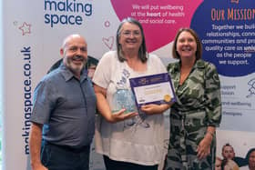 Julie Rose Neale collecting her award from charity Making Space.
