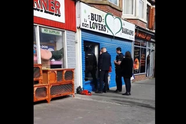Police raiding Bud Lovers Bargains in Poulton Road, Fleetwood on Saturday, March 18