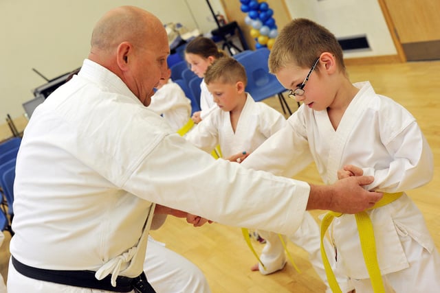 Karate instructors Sensei Julie and Sensei Tony Baker with class at Norbridge Academy (w120706-2h)