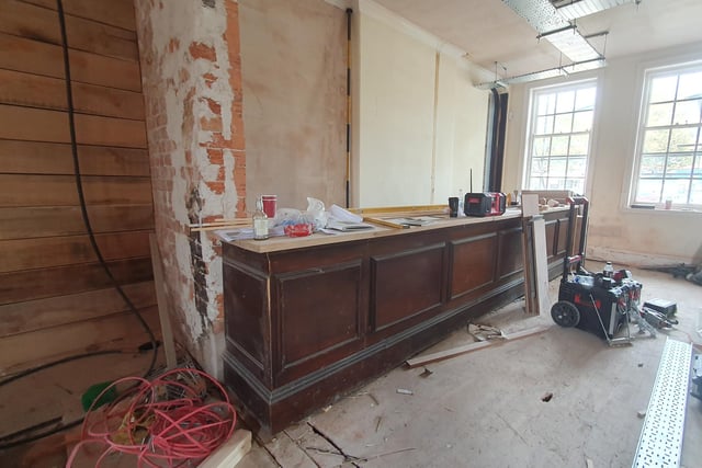 Builders have repurposed some of the old panels to create this counter area.