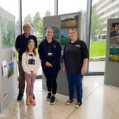 Dave Blacker from Blackpool Boys and Girls Club with Keira Threlfall and Dana Evans from communiyy interest company EPS, and  Breanna Iceton, eight, whose has artwork is included in the exhibition.

 

EPS is a CIC working with young people.