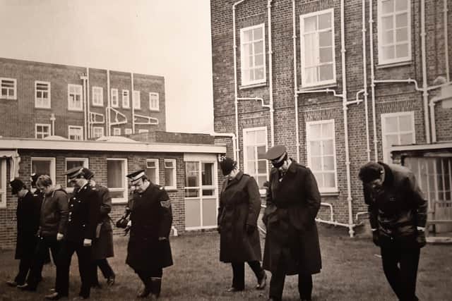 Police search the hospital grounds outside the area of Blackpool Victoria Hospital where the children's ward was