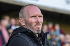 Michael Appleton has made a big call in dropping Dan Grimshaw to the bench