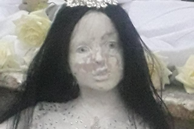 A creepy bride in the Halloween wedding tableau