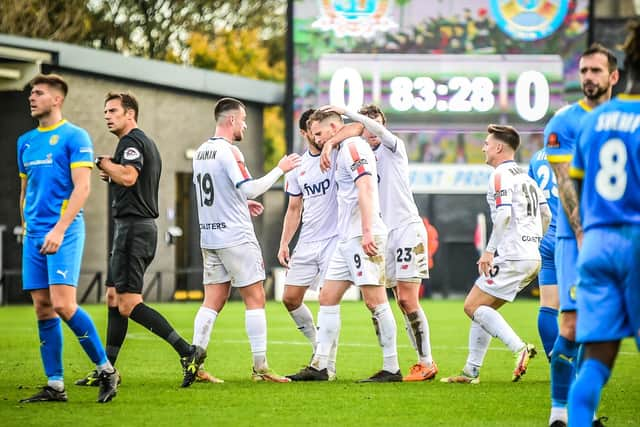 AFC Fylde celebrate Danny Rowe's winning goal against Peterborough Sports last weekend Picture: STEVE MCLELLAN