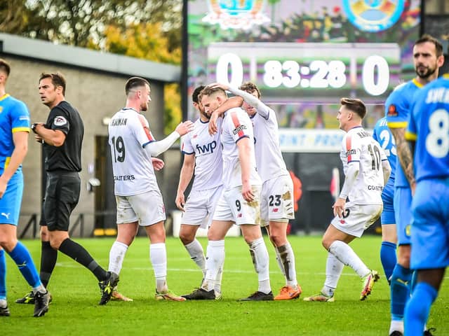 AFC Fylde celebrate Danny Rowe's winning goal against Peterborough Sports last weekend Picture: STEVE MCLELLAN