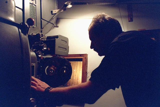 Chief projectionist Graham Robinson loading the final film at the Odeon before it closed in 1998