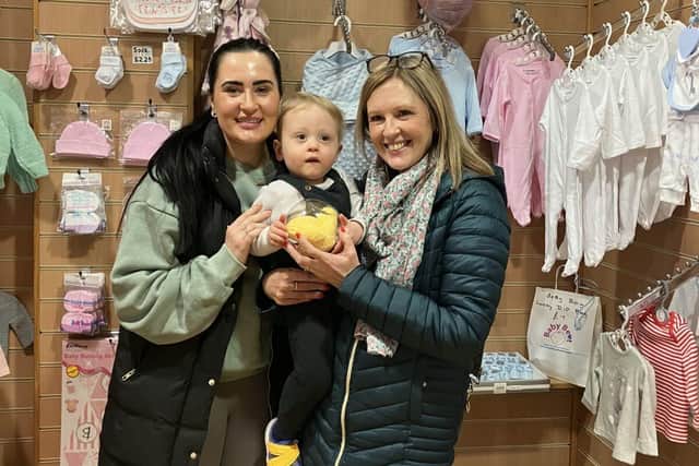 Lsley with Amber and Harry in the Baby Beat shop, Sharoe Green Maternity Unit, RPH