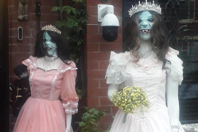 These bridesmaid look the part - apart from scaring everyone to death!