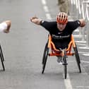 Eden Rainbow-Cooper (right) wins the women's wheelchair race from Samantha Kinghorn at the Great North Run