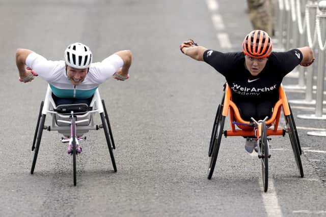Eden Rainbow-Cooper (right) wins the women's wheelchair race from Samantha Kinghorn at the Great North Run