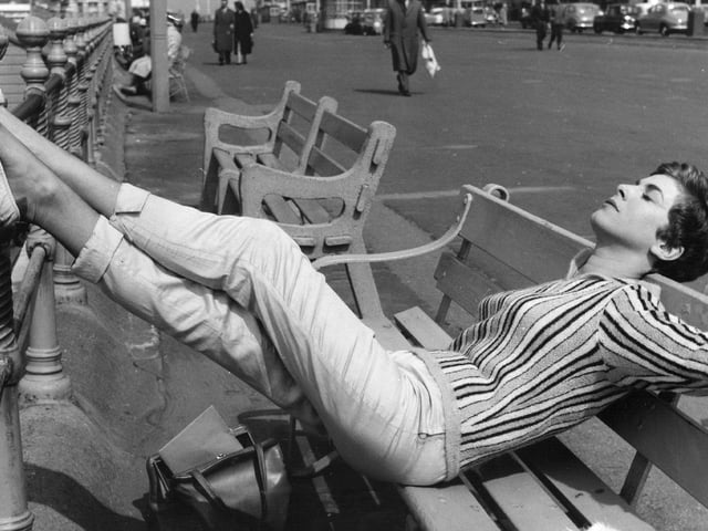 British actress Billie Whitelaw relaxing on the seafront when she was starring 'Progress In The Park', 1961