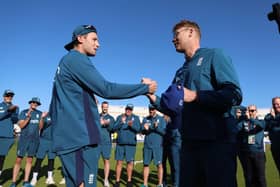 Tom Hartley of England is presented with his international cap by Andrew (Freddie) Flintoff during the 2nd Metro Bank ODI match between England and Ireland at Trent Bridge on September 23, 2023 in Nottingham, England. (Photo by Nathan Stirk/Getty Images)
