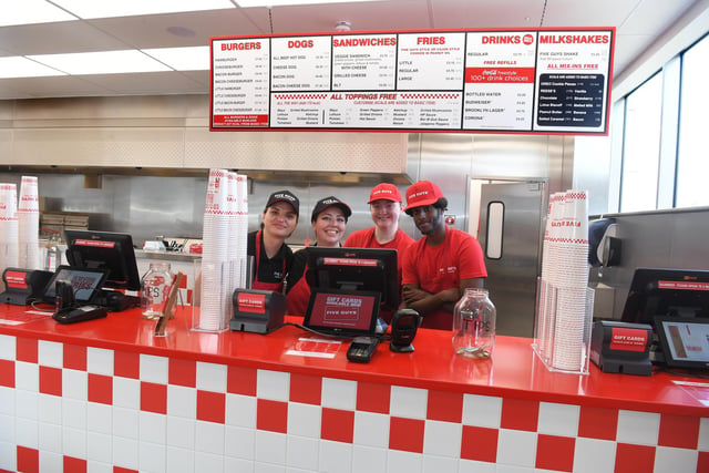 The restaurant's first customers were greeted with warm smiles during its opening day.