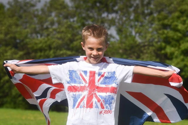 Henry Berry flies the flag at Thornton Primary School's Jubilee Garden Party