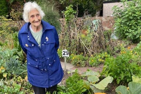 Having an allotment has been therapeutic for Senior Moments Hub members. Pictured is Brenda Fretton