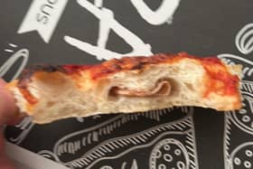 One customer was shocked to discover a used plaster inside his pizza