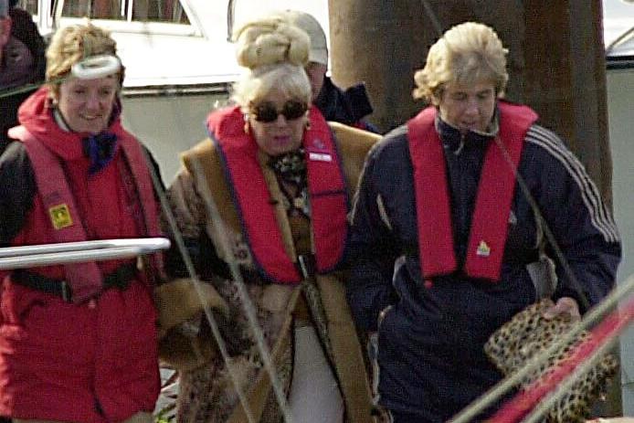 Wearing her trademark fur coat - and a life jacked - Bet Lynch, played by Julie Goodyear, is filmed at Fleetwood Marina