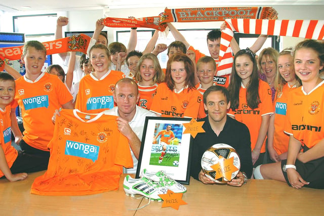 Blackpool FC's David Vaughan (right) and Stephen Crainey from  Baines High School. Pictured right is Francesca Horner (13) daughter of Blackpool physio Phil Horner