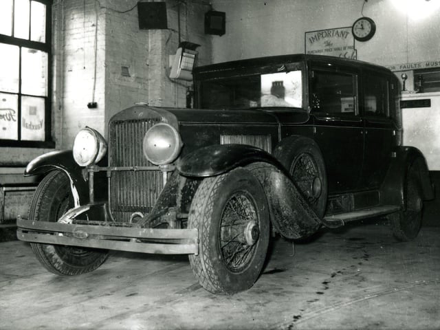 The car, in which gangster Al Capone died, stored at West Coast Motor Auction garage in Buchanan Street, Blackpool in 1958. The 1928, 30hp, Cadillac was armour plated, weighed 3 or 4 tons (depending on source of information) and had inch thick windows ( with bullet marks visible). It was sold to businessman Mr Neilson of Toronto, Canada.
Whilst in Blackpool the car was filmed by TV cameras as it free-wheeled down The Knowle hill, Devonshire Road, North Shore