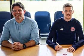 AFC Fylde's new signing Kieran Glynn (right) with director of football Chris Beech