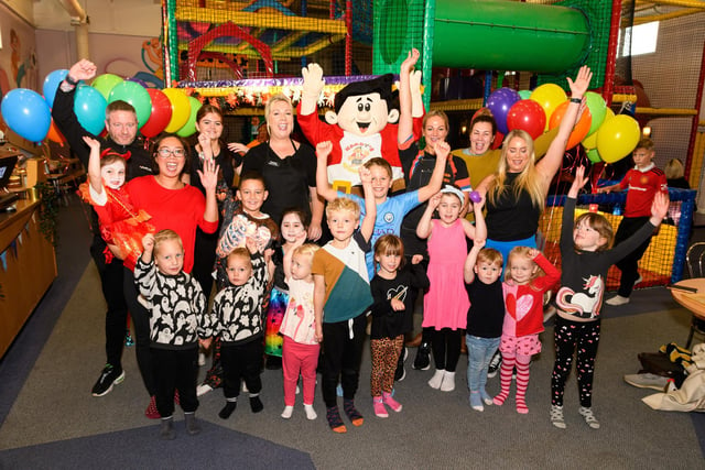 Staff, parents and children celebrate the reopening of Harry's Soft Play Centre at St Annes YMCA