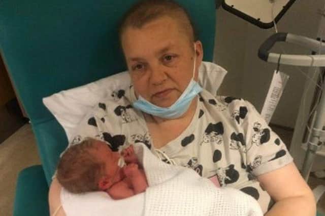 Carrie Dodds-Hallan with baby daughter Poppy