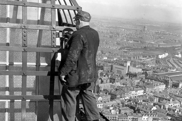 There's not a hard hat in sight for this brave chap painting away almost at the very top of Blackpool Tower in 1953