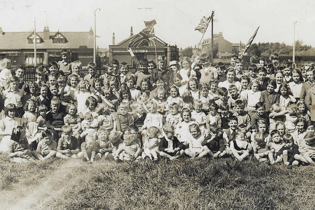 This scene captures youngsters celebrating VJ Day in 1945 on a field off Poulton Road in Fleetwood where St. Nicholas Church now stands