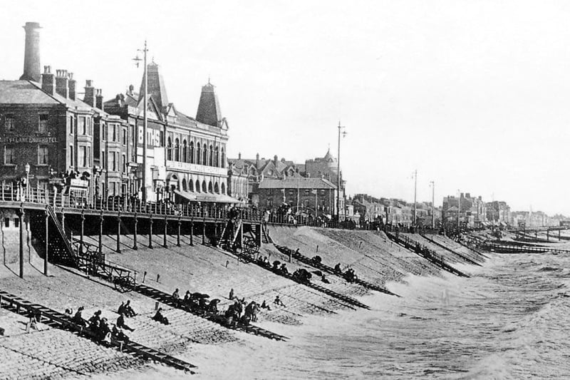 This photo of the promenade was taken in 1891, It is pre-tower days and pictures of this era are rare. The large building with "turrets" is the Prince of Wales Theatre, Market and Baths,  later the Palace Theatre. Naturally drawn to the sea, the promenade was one of the first roads to be constructed and is visible on early maps dating back to 1840