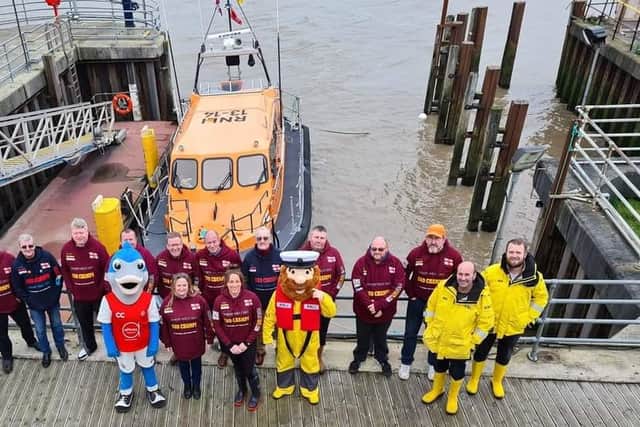 Hazel Tipping (front centre right), of Hookers Baits in Cleveleys, with members of Fleetwood RNLI, has organised the Fleetwood Cod Championships.