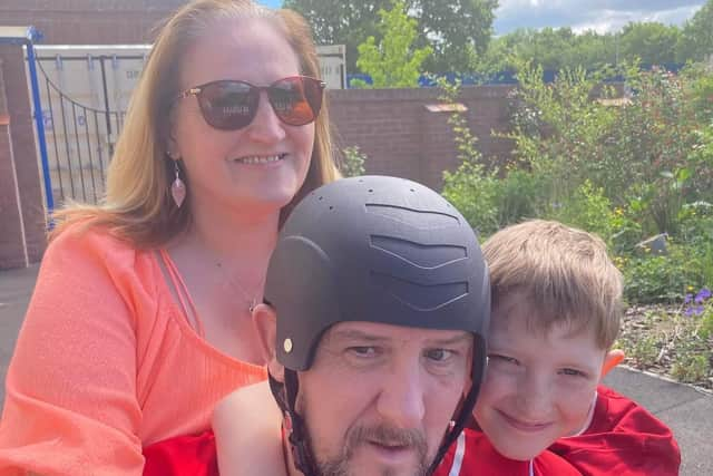 Zak with his parents Carol and Stephen