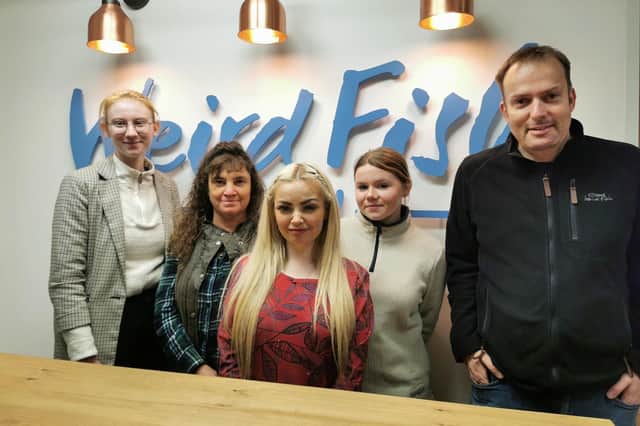 Alison Godfrey (second left), store manager of the new Weird Fish shop at Affinity Fleetwood, with area manager Jason Wadsworth and fellow members of staff.
