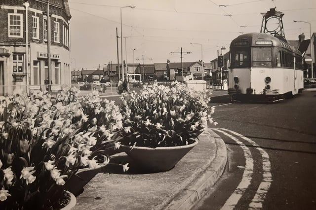 An old tram features in this lovely spring scene at the crossroads