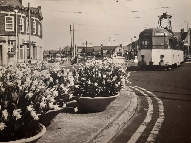 An old tram features in this lovely spring scene at the crossroads