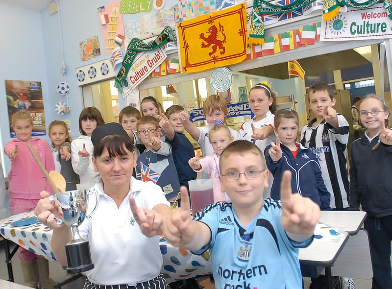 Back to 2008 and this view of the St Mary's RC Primary School cook Jo Caffery with pupils.