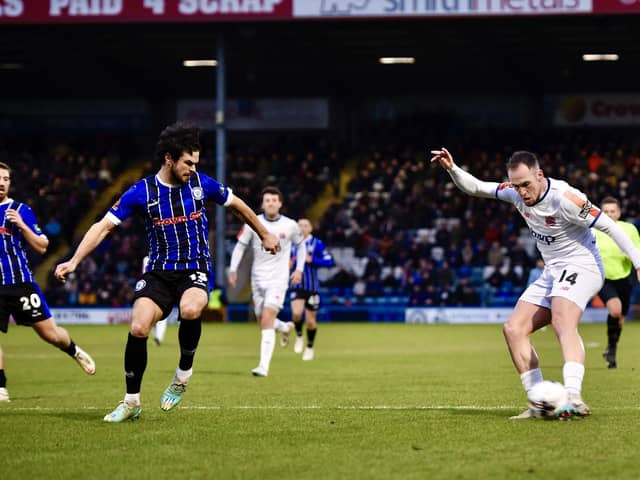 Josh Kay tries his luck for AFC Fylde at Rochdale  Photo: STEVE MCLELLAN