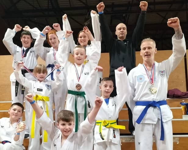 All smiles for Mount Taekwondo Club as they celebrate success in the Poomsae Division at the British Spring Open