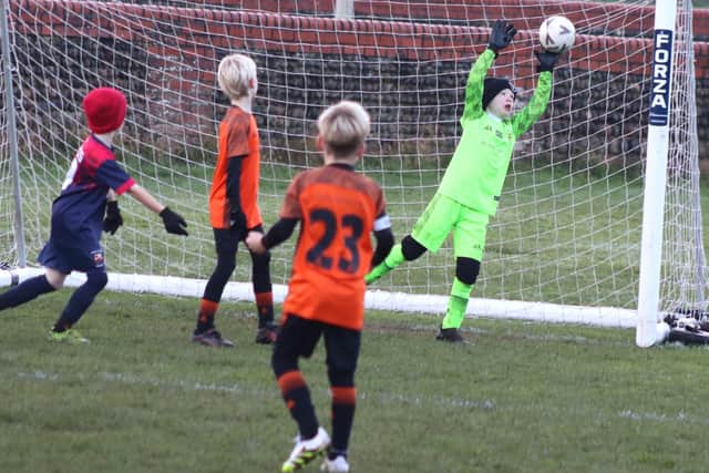 YMCA Blacks and Fylde Coast Soccer Iniestas U8s met in the B&DYFL last weekend Photo: Karen Tebbutt