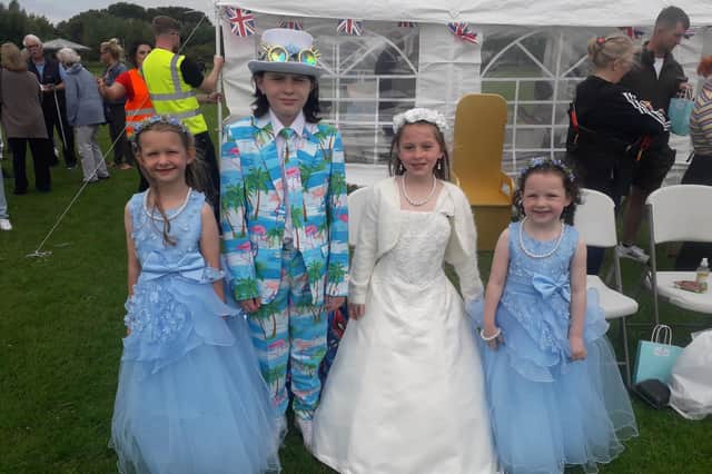 It was a big day for Pixie Hammond, the Thornton Cleveleys Rosebud Queen, and her retinue. Pictured are (from left) Lilah Cross, Clayton Hammond (Prince Charming), Pixie Hammond (Rose Queen) and Jessica Farrell