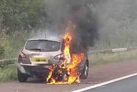 A car burst into flames on the M6 northbound near Preston (Credit: Megan Callaghan)