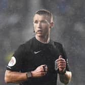 Referee Thomas Bramall disallowed the goal after deliberating with his linesman