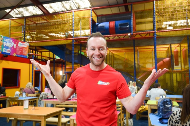 Dan Whiston showing off the play centre's facilities.