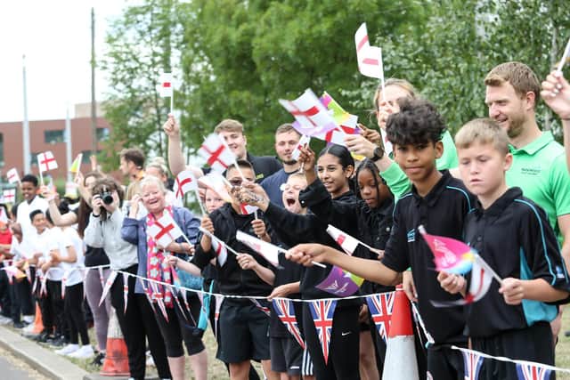 A crowd cheers during the Birmingham 2022 Queen's Baton Relay at Sheffield Olympic Legacy Park on July 12 in Sheffield(Photo by Nick England/Getty Images for Birmingham 2022 Queen's Baton Relay)