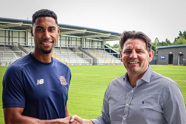 Gold Omotayo and AFC Fylde director of football Chris Beech Picture: AFC Fylde