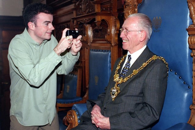 Young persons council member Kenny Logue taking pictures of mayor of Blackpool Cllr Bill Burgess